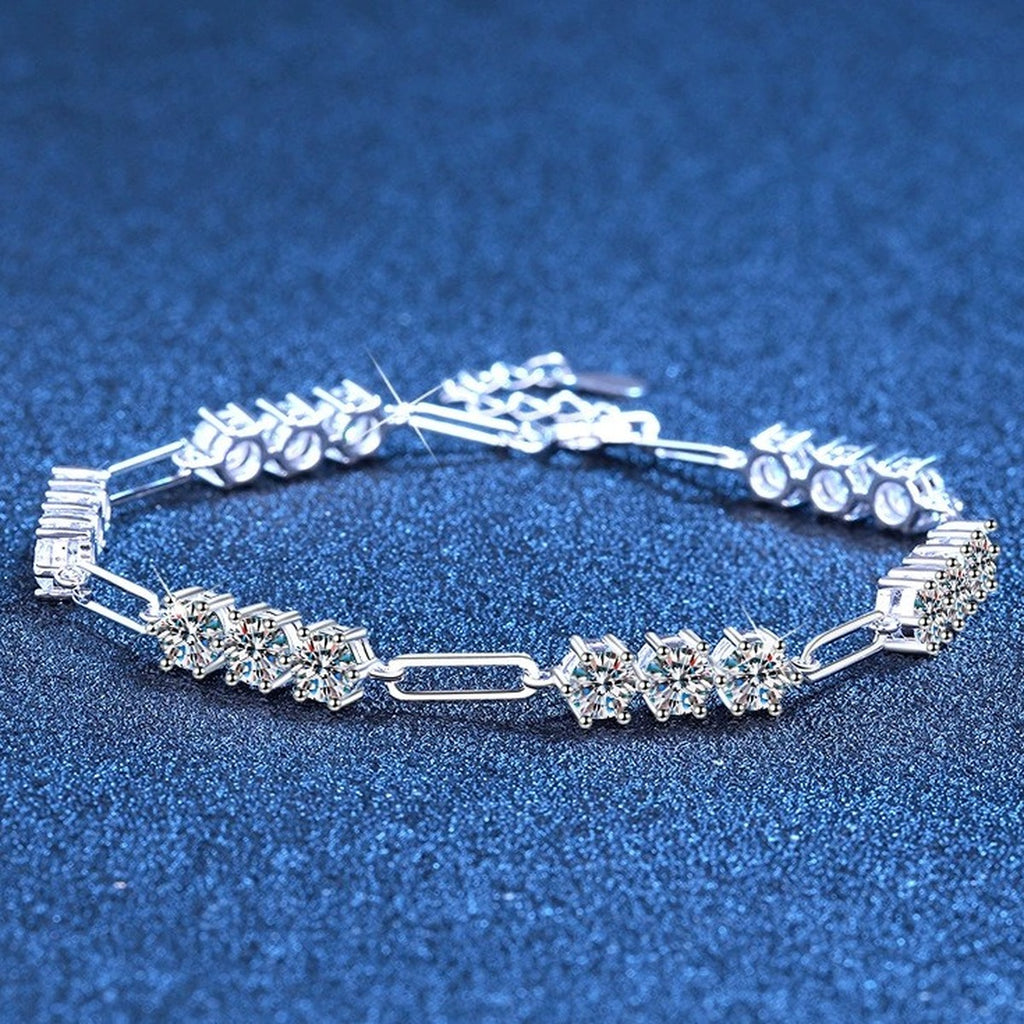 Cluster Moissanite Chain Bracelet styled on blue display background showing moissanite sparkle