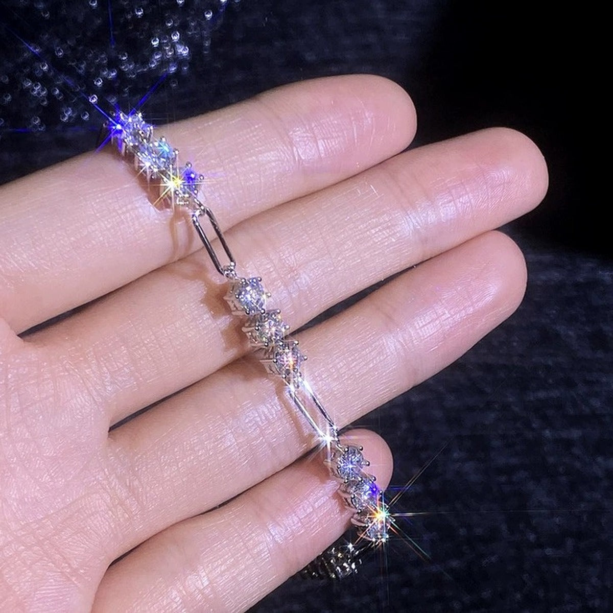 Cluster Moissanite Chain Bracelet held in hand close-up showing bracelet scale and detail