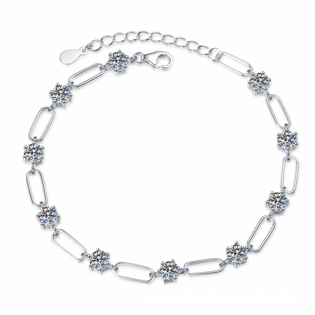 Three-Stone Moissanite Chain Bracelet white background product photo showing bracelet silhouette and moissanite setting