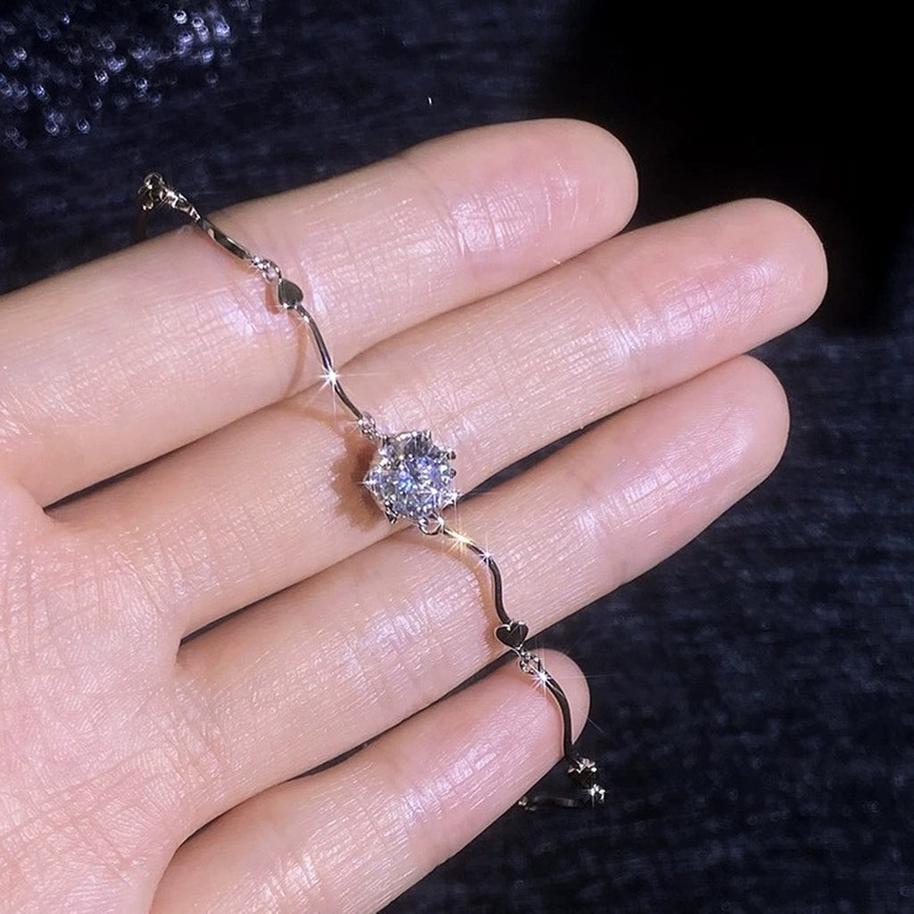 Round Moissanite Chain Bracelet worn on wrist by model showing bracelet scale and fit