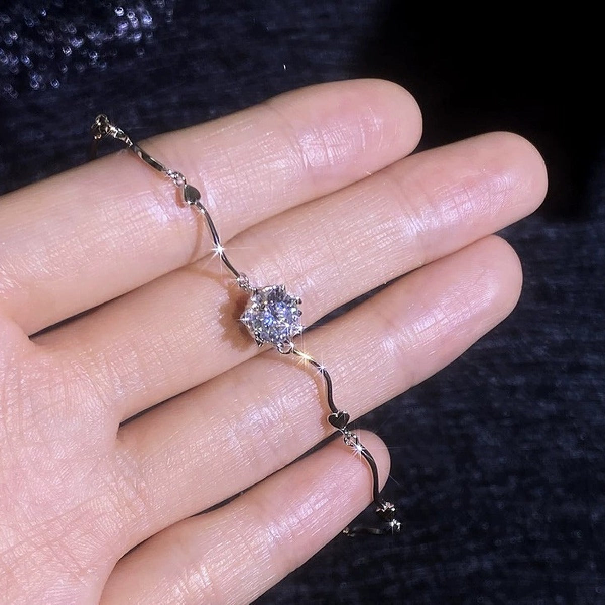 Round Moissanite Chain Bracelet worn on wrist by model showing bracelet scale and fit