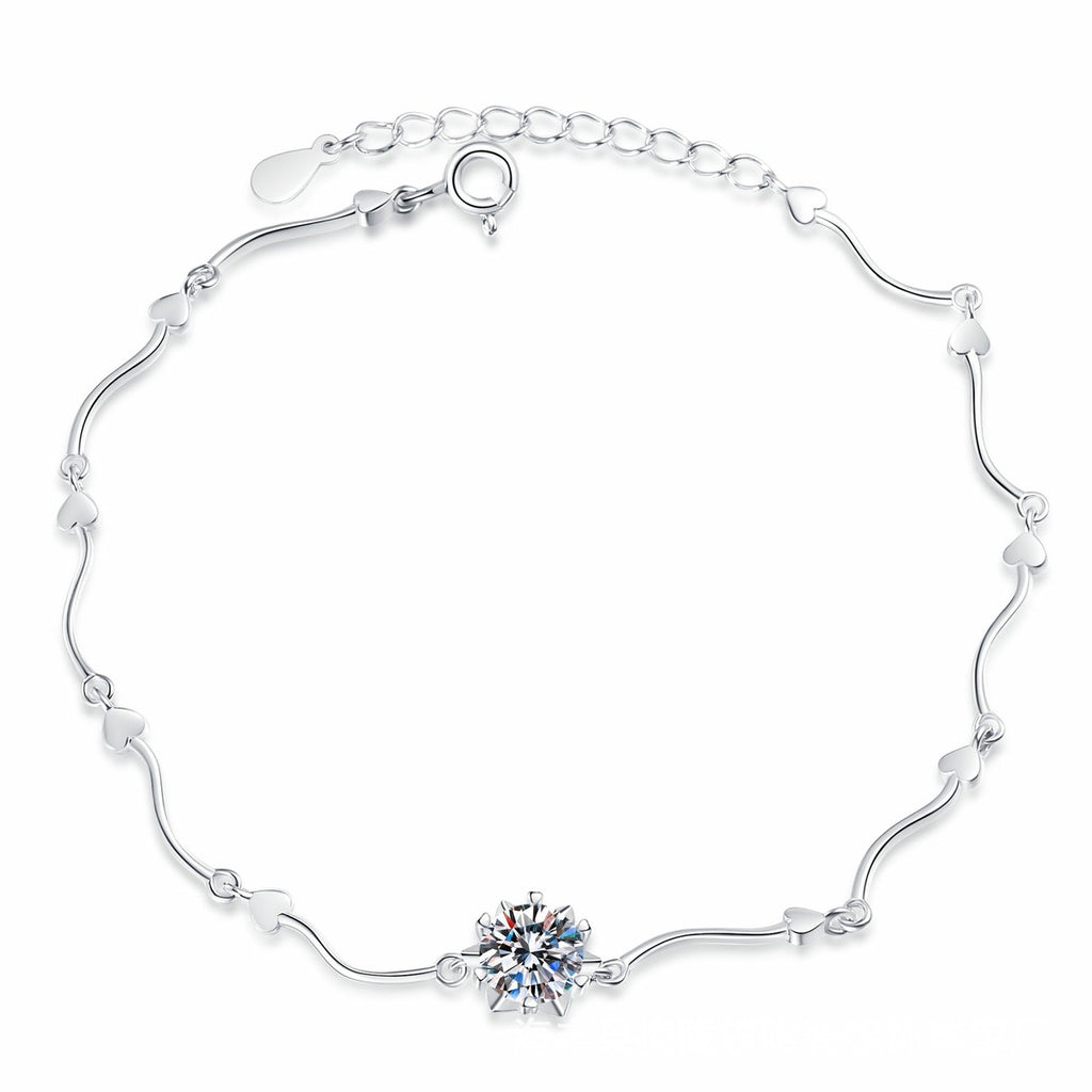 Round Moissanite Chain Bracelet styled on blue display background showing moissanite sparkle