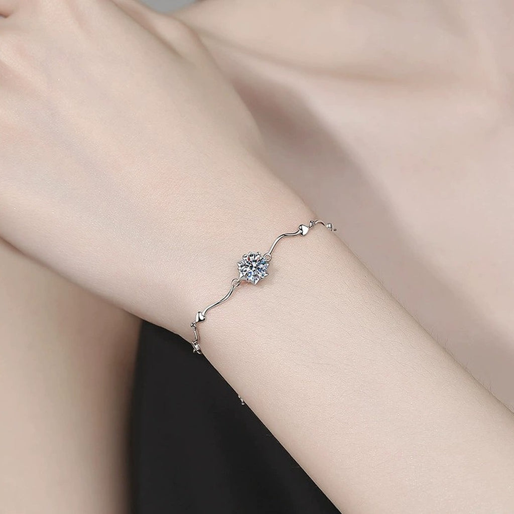 Round Moissanite Chain Bracelet held in hand close-up showing bracelet scale and detail