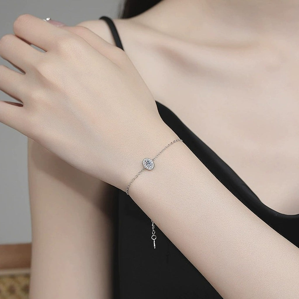 Round Moissanite Chain Bracelet with CZ white background product photo showing bracelet silhouette and moissanite setting
