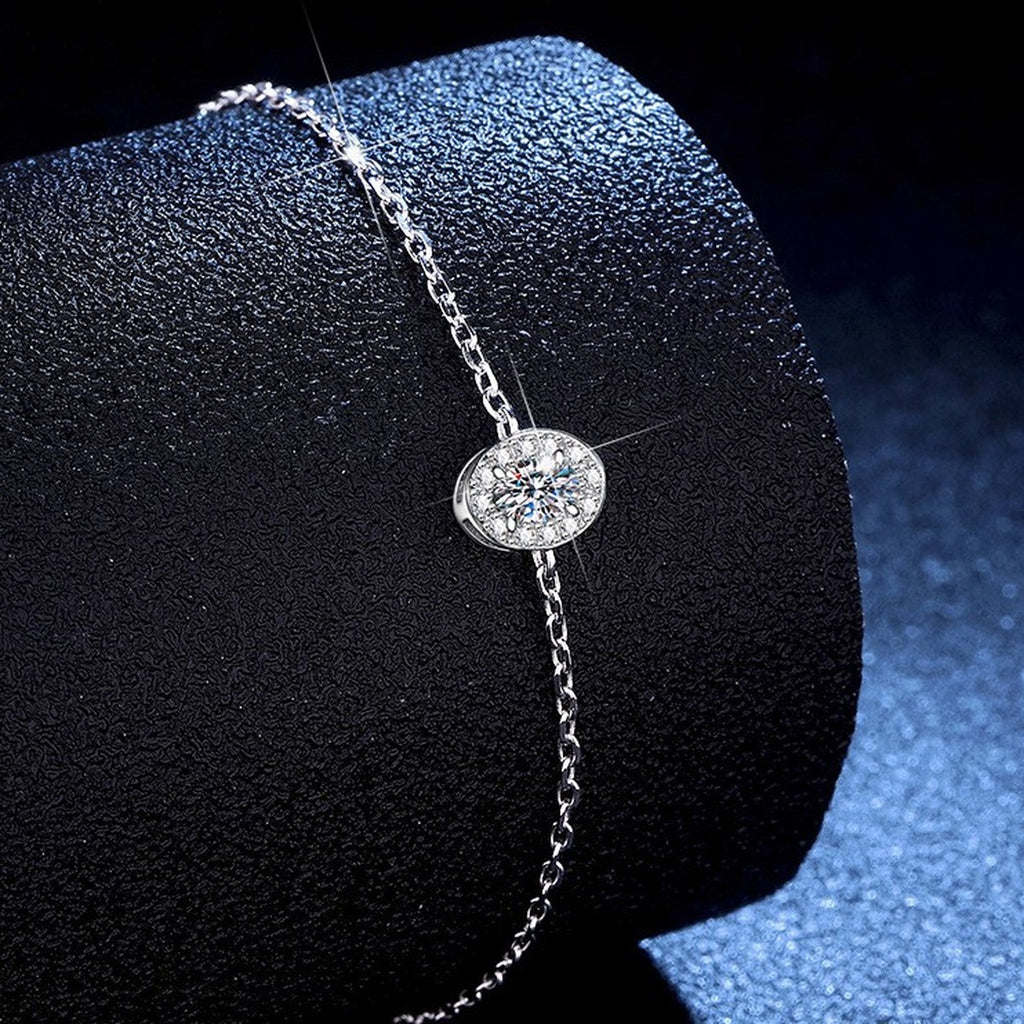 Round Moissanite Chain Bracelet with CZ held in hand close-up showing bracelet scale and detail