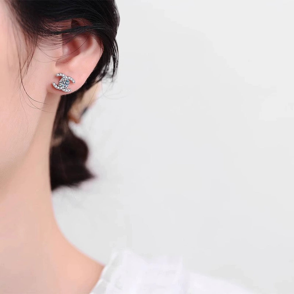 Geometric Round Moissanite Stud Earrings with CZ in Gold-Plated S925 sterling silver worn on ear by model showing scale, placement, and stud earrings styling