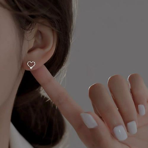 Beaded Heart Round Moissanite Stud Earrings in Gold-Plated S925 sterling silver worn on ear by model showing scale, placement, and stud earrings styling
