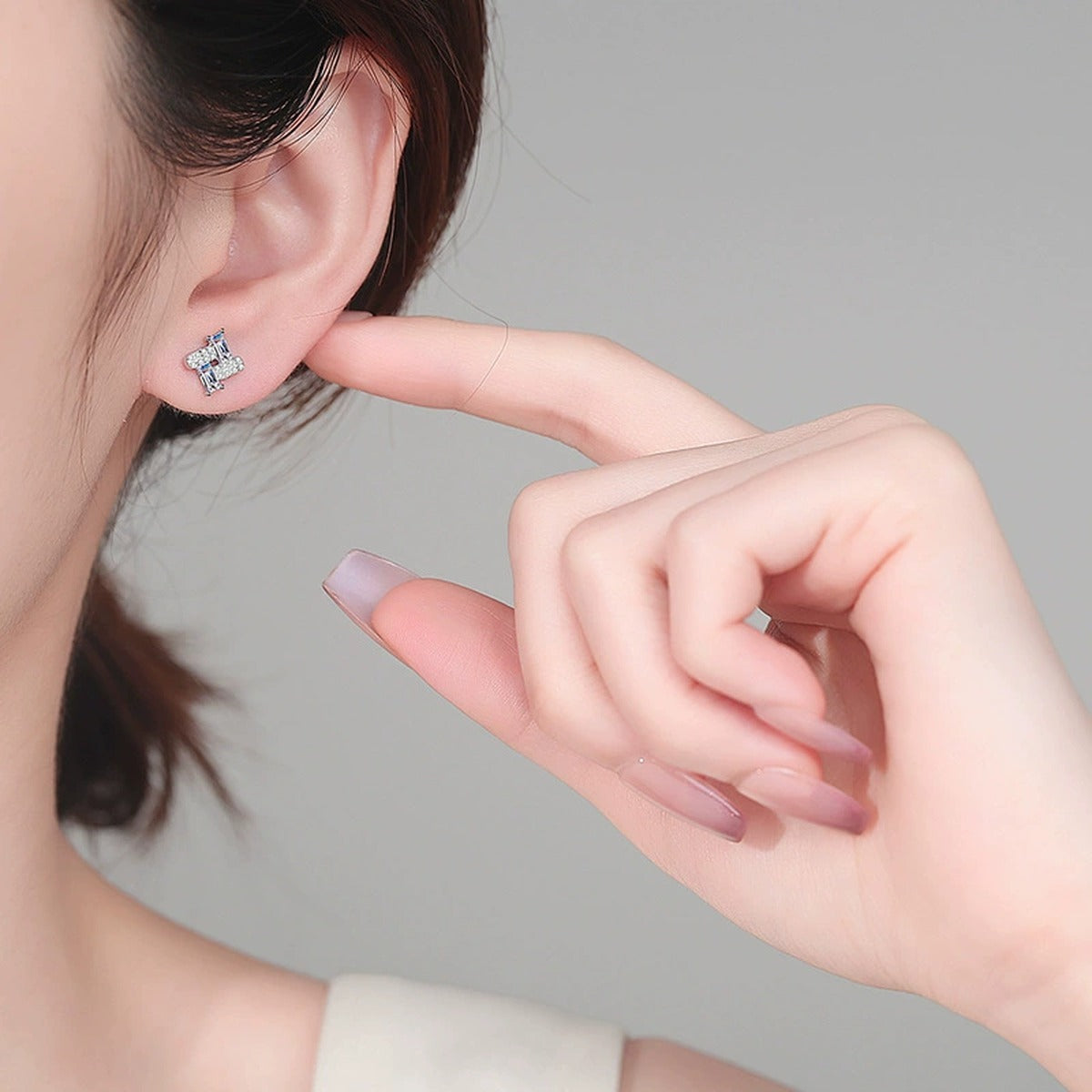 Emerald-Cut Moissanite Geometric Stud Earrings with CZ in Gold-Plated S925 sterling silver product scene view showing front sparkle
