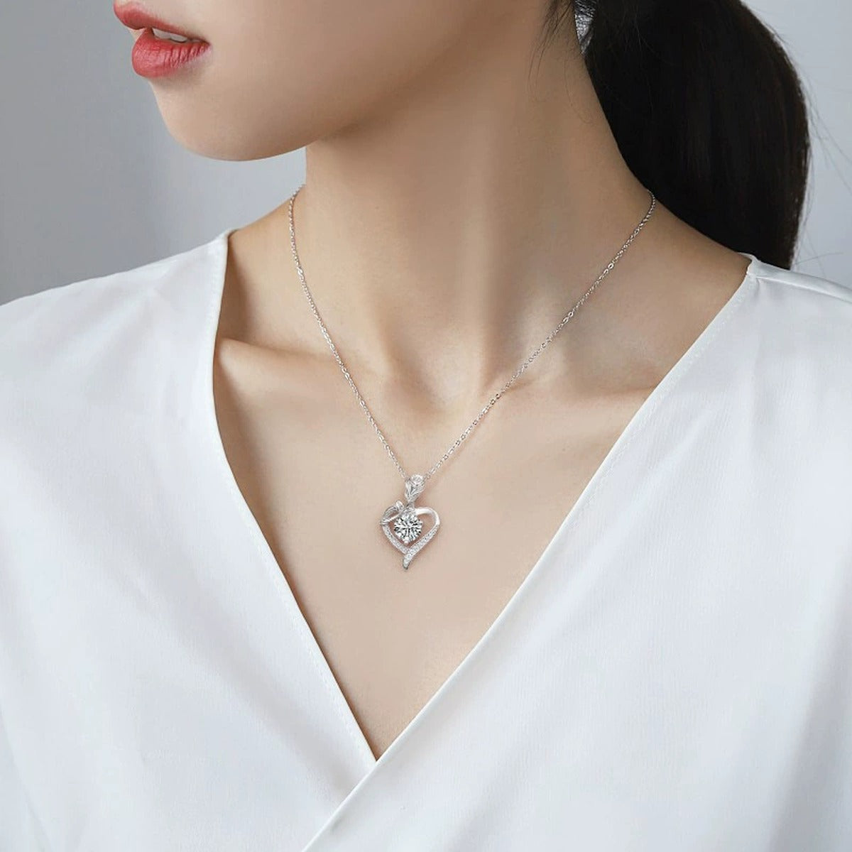 Rose Heart Colored Moissanite Necklace with CZ in White Gold-Plated S925 sterling silver neckline model view showing pendant scale and chain length