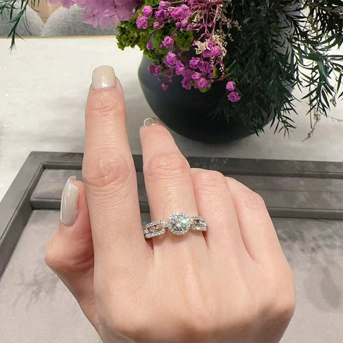Bezel Round Moissanite Wedding Band with CZ worn on hand to show scale, band width, and ring profile