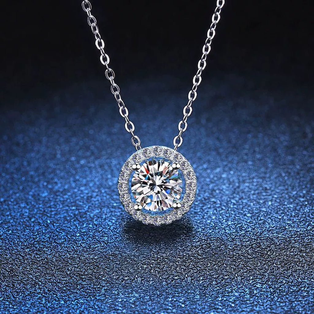 Round Halo Moissanite Pendant Necklace with Cubic Zirconia in White Gold-Plated S925 Sterling Silver blue background product view