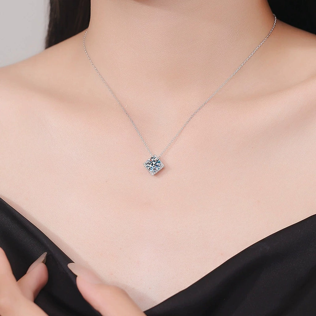 Cushion Halo Moissanite Pendant Necklace in Platinum-Plated S925 Sterling Silver worn on neckline by model
