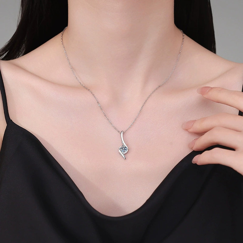 Curved Line Moissanite Pendant Necklace in Platinum-Plated S925 Sterling Silver worn on neckline by model
