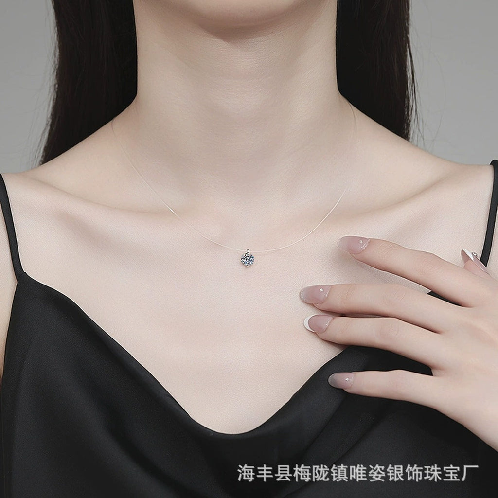 Round Moissanite Pendant Necklace in White Gold-Plated S925 Sterling Silver worn on neckline by model