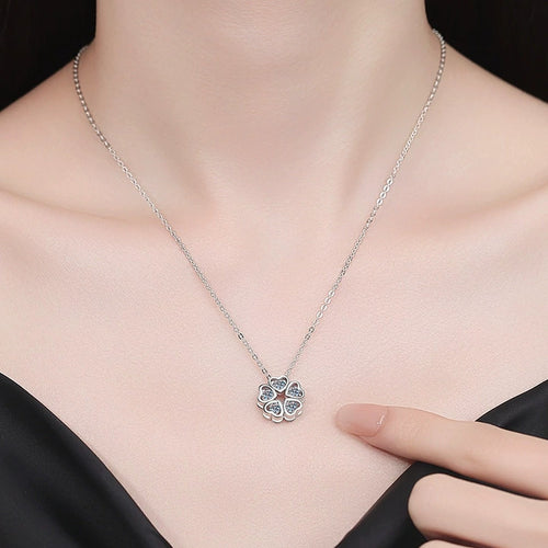 Clover Moissanite Pendant Necklace in Platinum-Plated S925 Sterling Silver worn on neckline by model
