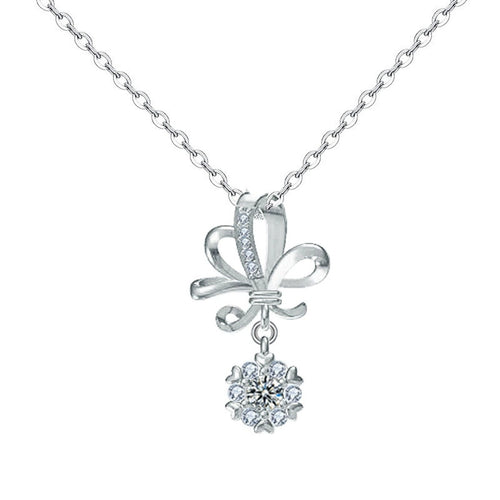 Bowknot Round Moissanite Necklace with CZ in White Gold-Plated S925 sterling silver white background product photo showing bowknot ribbon pendant with a small dangling round moissanite and CZ accents