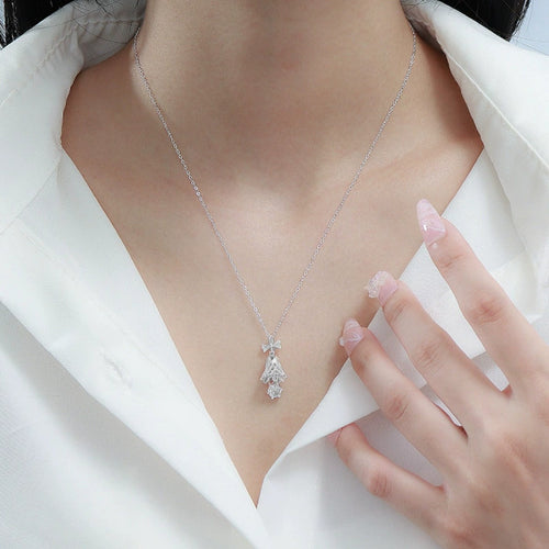 Bow Bell Round Moissanite Necklace with CZ in Gold-Plated S925 sterling silver neckline model view showing pendant scale and chain length