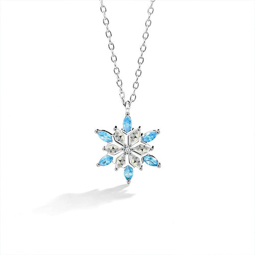 Blue CZ Snowflake Moissanite Necklace in White Gold-Plated S925 sterling silver white background front product view showing a snowflake composed of round moissanite and blue CZ points