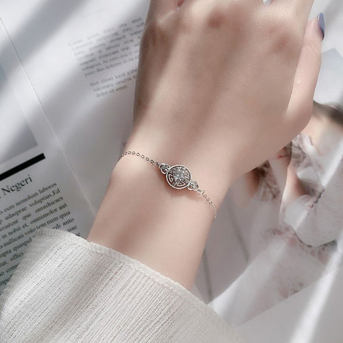 Ancient Coin Round Moissanite Adjustable Bracelet with CZ in White Gold-Plated S925 Sterling Silver worn on the wrist showing bracelet scale, fit, and styling